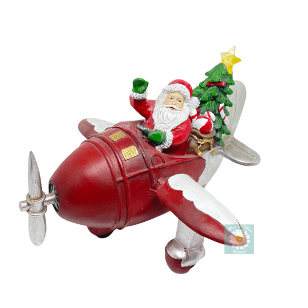decorazione natale casa, babbo natale che guida un aereo in resina, idea regalo