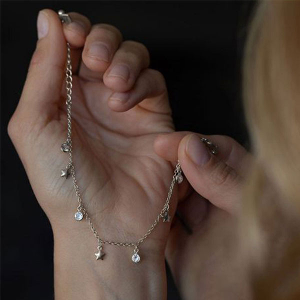 bracciale catena argento ciondoli punti luce e stelle vestopazzo donna