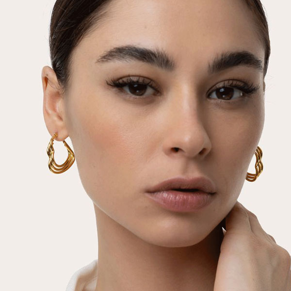 orecchini cuori intrecciati acciaio placcati oro vestopazzo donna